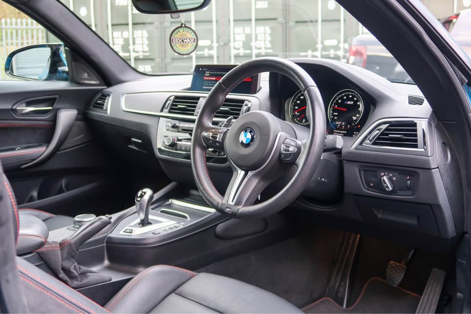 Clone interior showing Black / Orange leather and DCT transmission